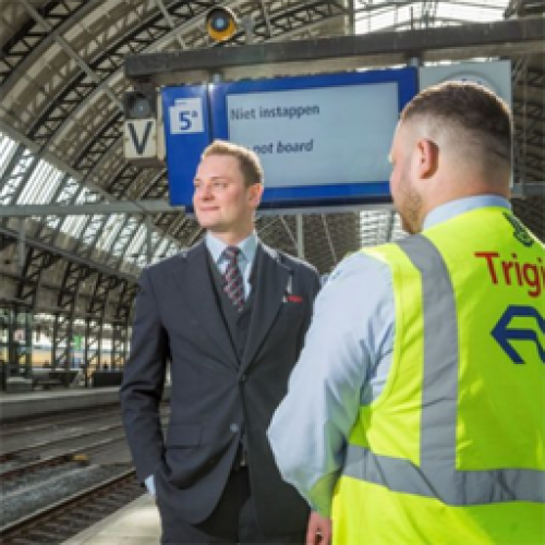 Jan Pieter Blok op Amsterdam Centraal met Trigion collega