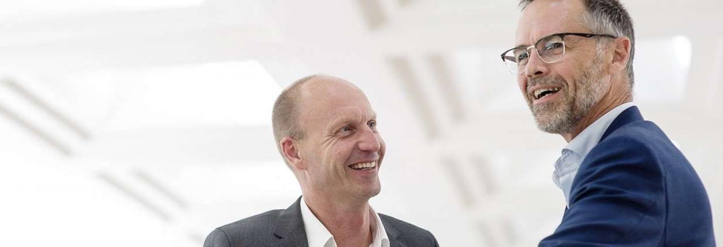 Foto van twee mannen van Facilicom Group